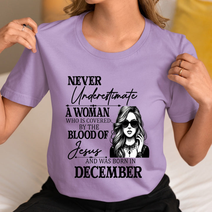 Never Underestimate A Woman Born In December - Unisex T-Shirt