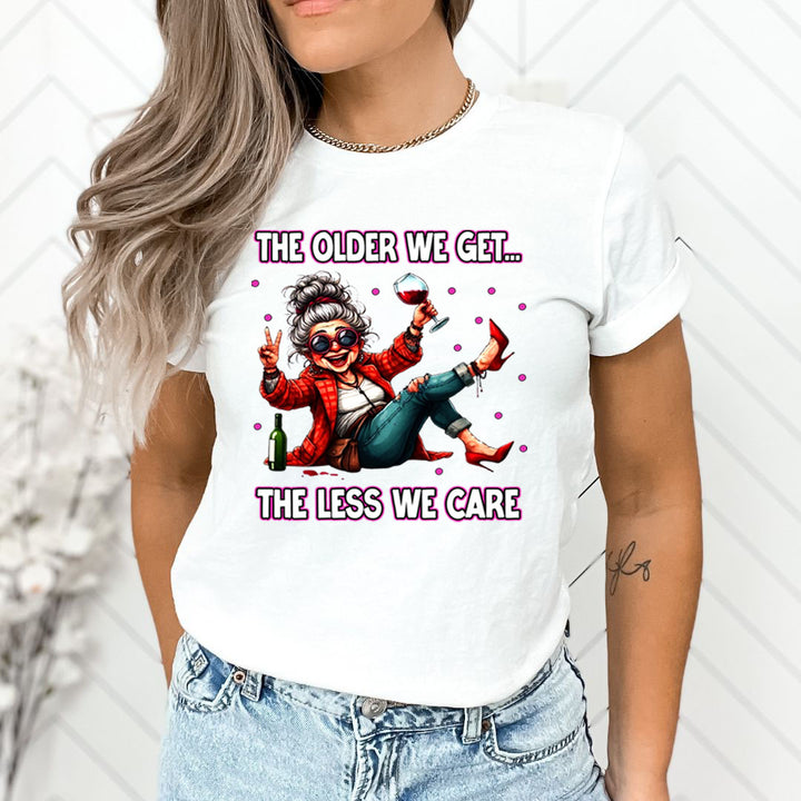 The Older We Get.. The Less We Care  - Unisex T-Shirt